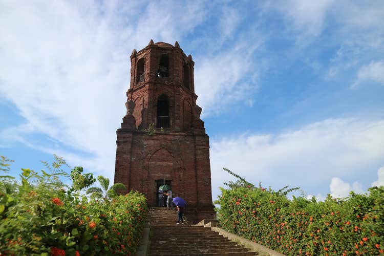 This private day tour from Currimao Cruise Port to Vigan City takes you to the Bantay Church Bell Tower, a symbol of the region.