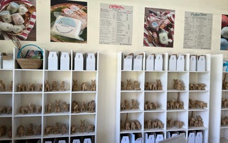 Taka figurines ready for a fun hand-painting activity on this Pinkie’s Farm picnic and tour