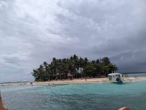 Exciting 4-Day Siargao Island Tour Package at Caracoa Resort with Local Flights & Surfing Lesson