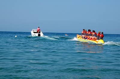 People enjoying the clear waters of The Muse Hotel