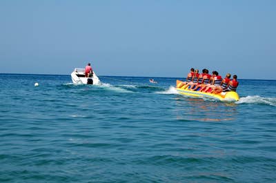 People enjoying the clear waters of The Muse Hotel