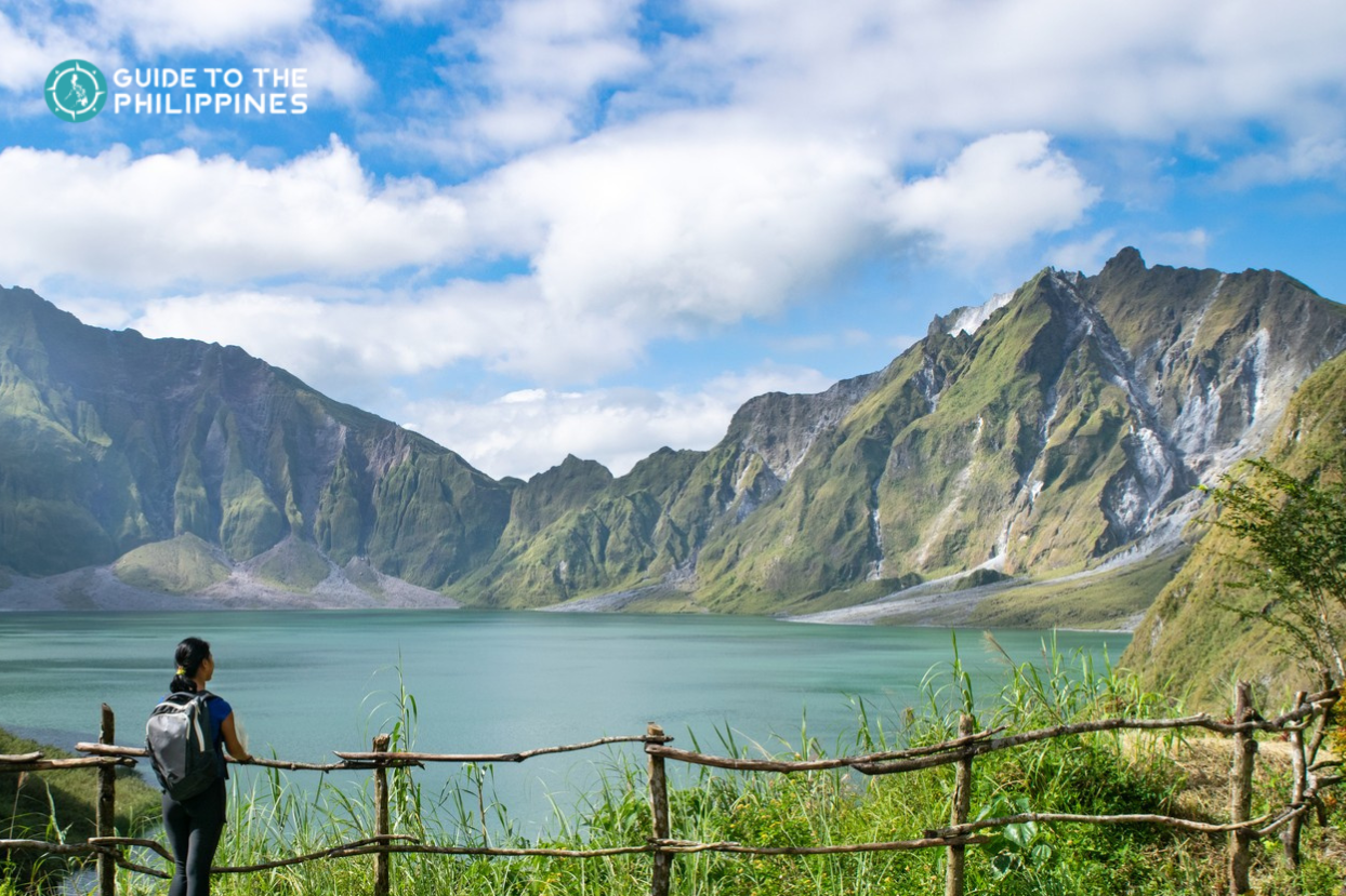 A hiker appreciating the view of Mt. Pinatubo's crater lake.