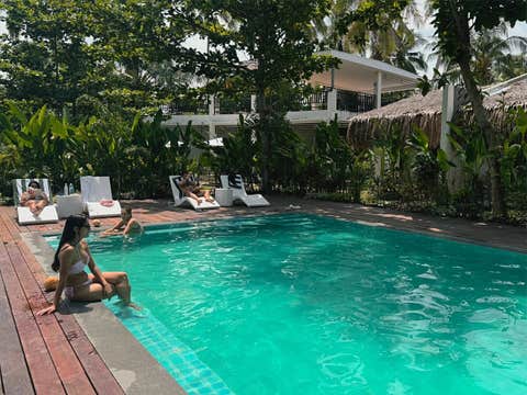 Refreshing 4-Day Siargao Island Tour Package at Bahandi Hotel with Local Flights & Surfing Lesson