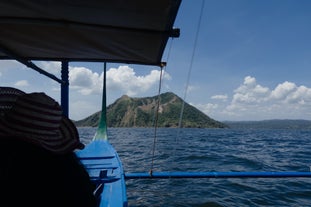 You'll ride a boat on this tour that will bring you close to Taal Volcano