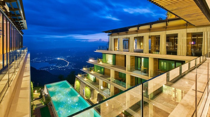 A photo showcasing the stunning view from the veranda of Escala Hotel in Tagaytay city. A photo showcasing the stunning view from the veranda of Escala Hotel in Tagaytay city.