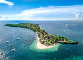 A stunning aerial view of Tulang Diot Island, one of the top destinations in the Camotes Island tour