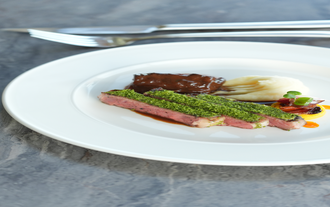 Enjoy the perfectly grilled U.S. Ribeye Prime with tender braised beef cheeks, an entree at Sinta, one of the premier restaurants in Tagaytay City.