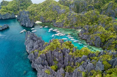 Take a walk in the Palawan El Nido's 7 Commando's Beach or explore the resort's amenities.