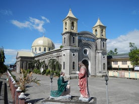 Pause for prayer at St. Peter Apostle Parish Church during this Visita Iglesia tour to churches in Pampanga Province.