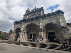 The grand façade of Manila Cathedral, captured during this Intramuros old town walking tour