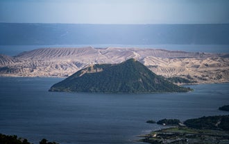 A scenic view of Taal Lake and Taal Volcano that is best seen during a Tagaytay City highlands tour