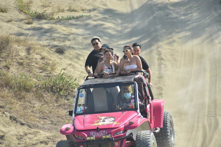 Capture the rugged charm of the Paoay Sand Dunes in  Ilocos Norte Province