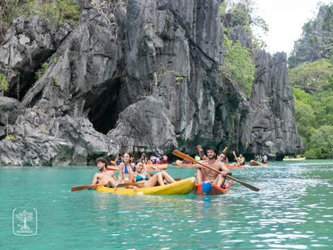 Deluxe Island Hopping Tour in El Nido Town with Lunch, Photographer, and Fun Games