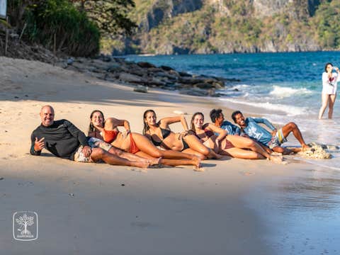 Deluxe Island Hopping Tour in El Nido Town with Lunch, Photographer, and Fun Games