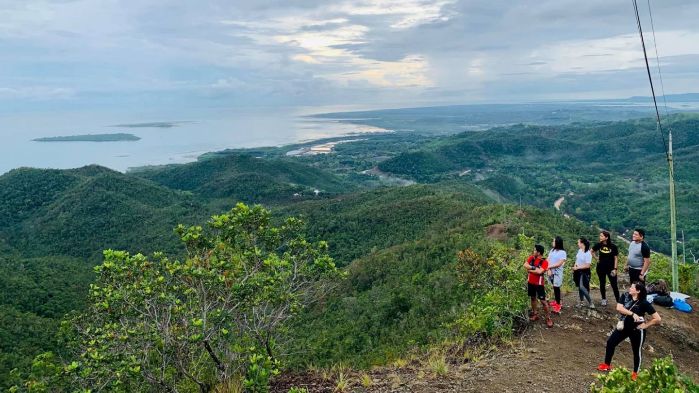 Hikers make their way up the forested trail during this Mt. Magarwak sunrise hike.