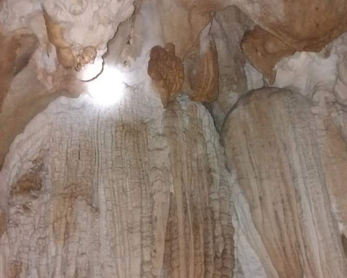 Smooth rock contours reveal nature’s sculpture work during this cave tour in Puerto Princesa City.