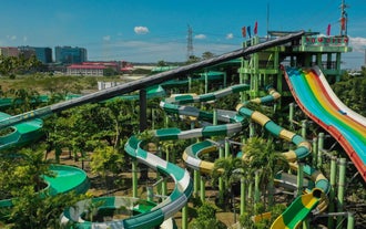 The colorful giant slides at Splash Island Waterpark in Laguna Province are perfect for thrill-seekers of all ages