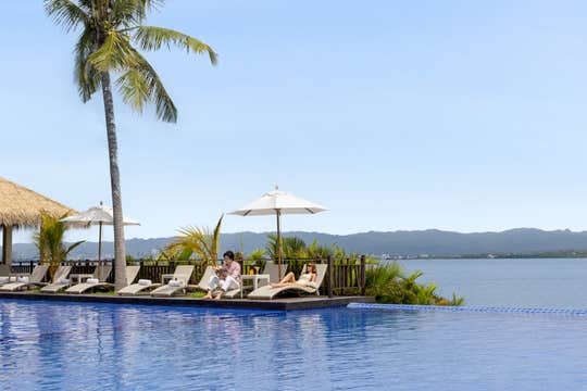 Day Pass to Dusit Thani Mactan Resort in Cebu Province with Dining Credits