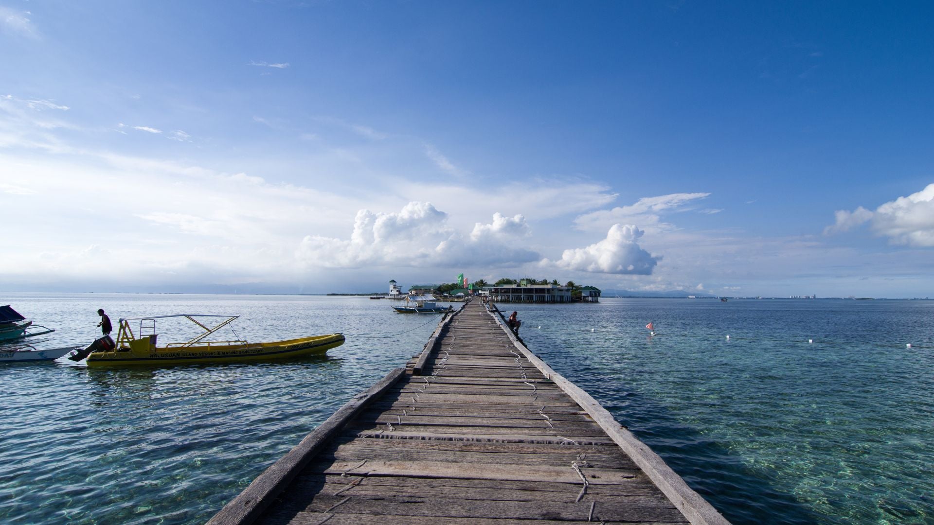 Experience the cold turquoise waters of Tumalog Falls