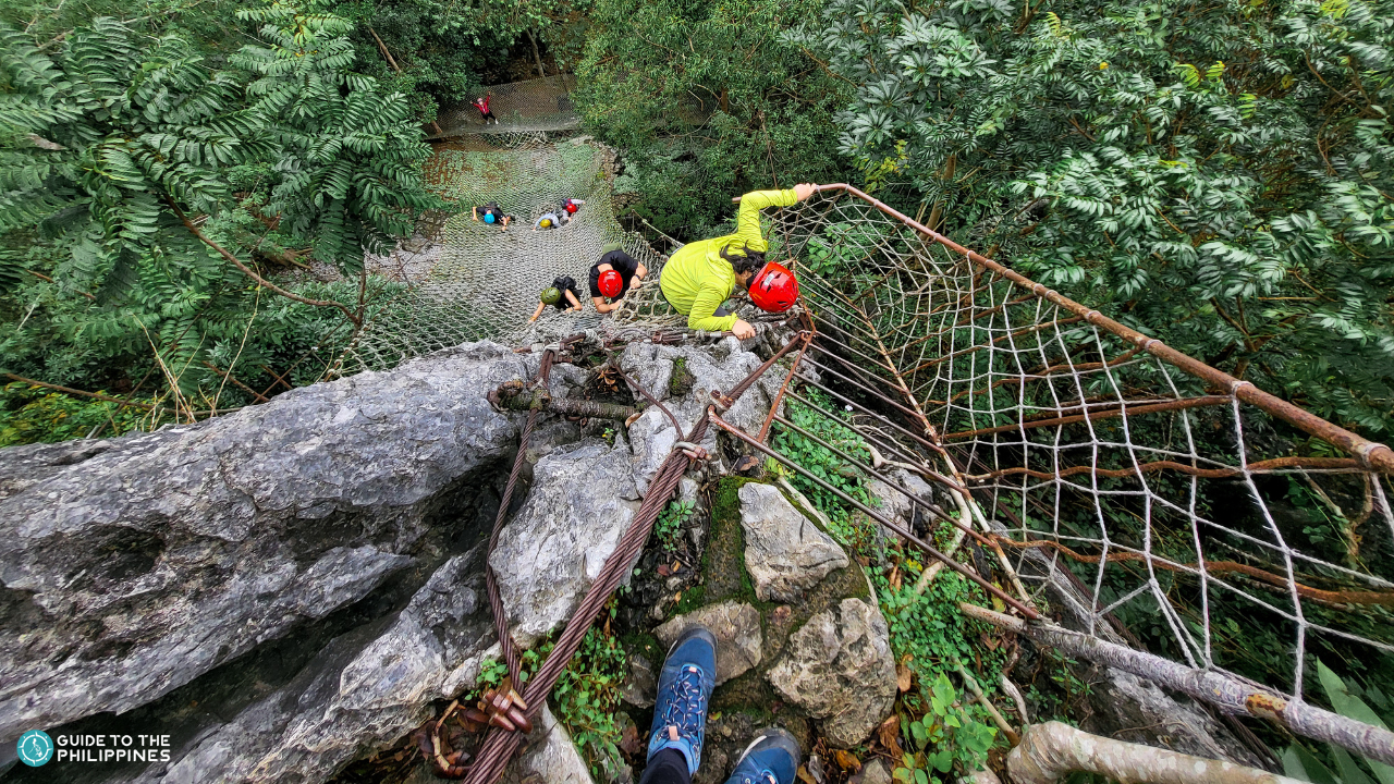Visitors enjoying one of the thrilling activities during a hike through Masungi Georeserve.